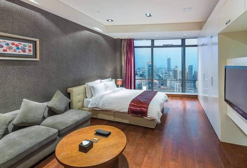 Номер Deluxe, Grand Madison Qingdao Harbourview Central（former Qingdao Farglory ）