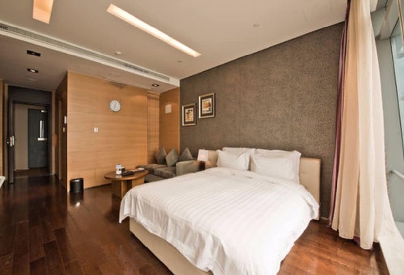 Номер Deluxe, Grand Madison Qingdao Harbourview Central（former Qingdao Farglory ）