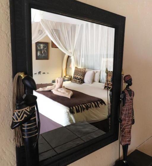 اتاق لوکس با تخت بزرگ, African Rock Lodge