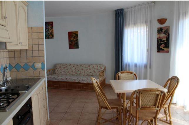 Апартаменты 1 Спальня с Террасой, Residence Il Borgo Di Porto Corallo