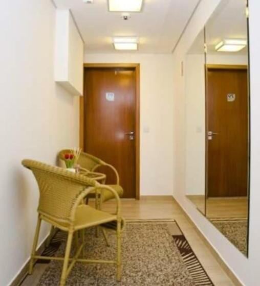 Quarto Triplo Estandar, Millian