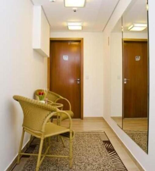 Quarto Triplo Estandar, Millian