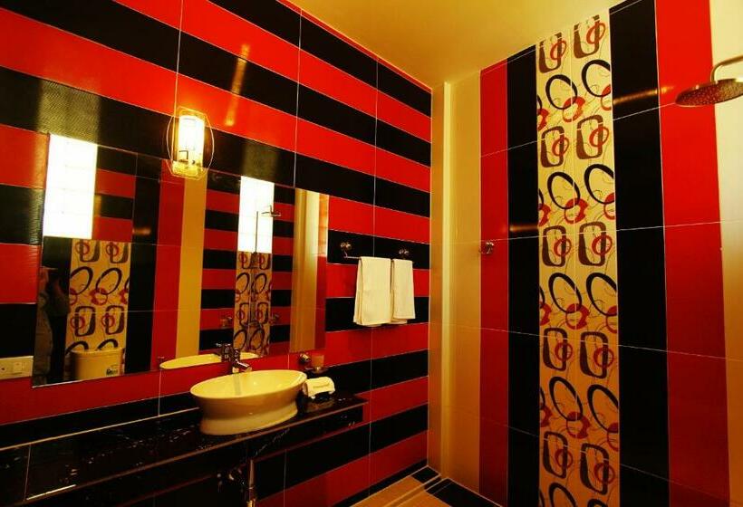 Quarto Triplo Deluxe Vista Mar, Mountain Reef Beach Resort