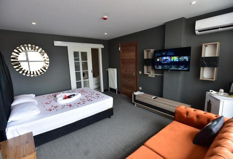 Quarto Estandar Cama King, Ottoman Suit Apartment &
