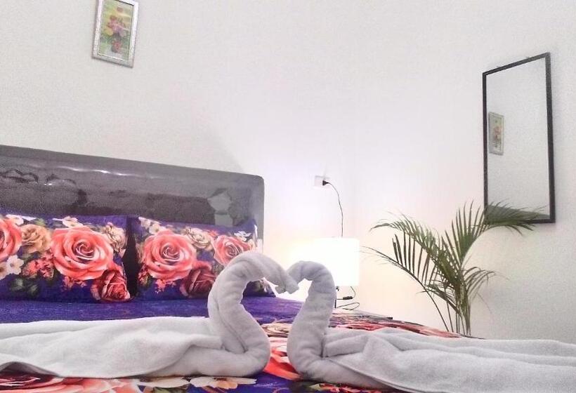 Economy Quadruple Room, Balige J&j Guest House 2