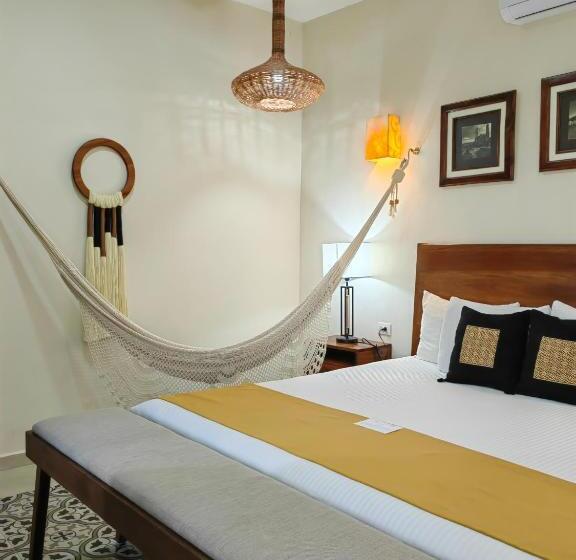 מיטת קינג בסוויטה, Le Muuch Hotel Boutique
