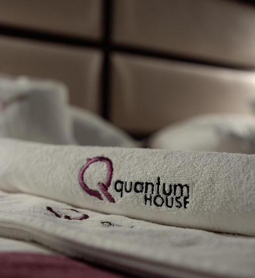 Номер Стандарт, Quantum House