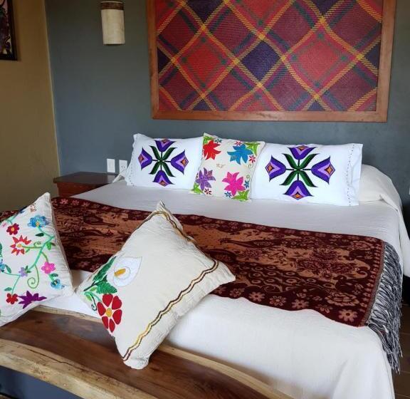 キングサイズベッドのデラックスルーム, Casa Arcoiris Zihuatanejo B&b
