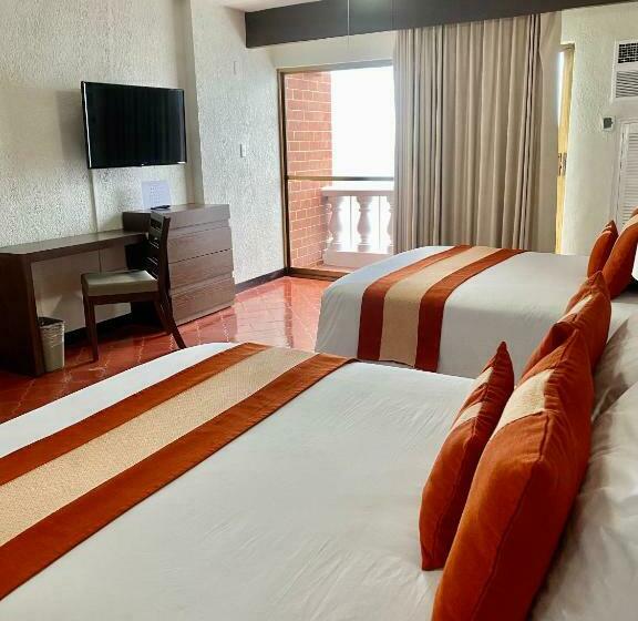 Quarto Deluxe Vista Mar, Costa Sur Resort & Spa