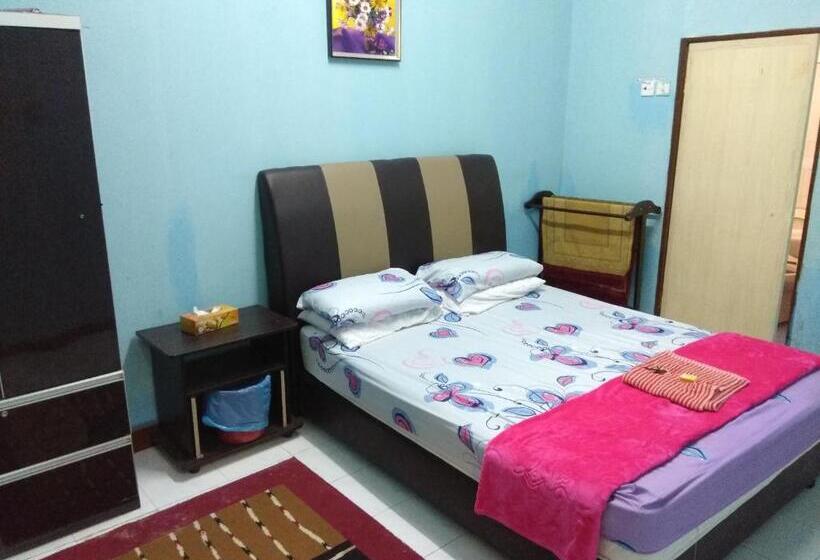 اتاق خانوادگی با چشم‌انداز باغ, Seri Lagenda Apartment