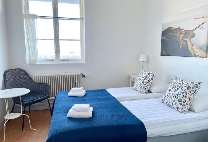 Quarto Estandar Banheiro Compartilhado, Fästningens