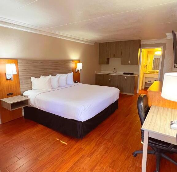 キングサイズベッドのスタンダードルーム, Casa Bella Inn & Suites Extended Stay