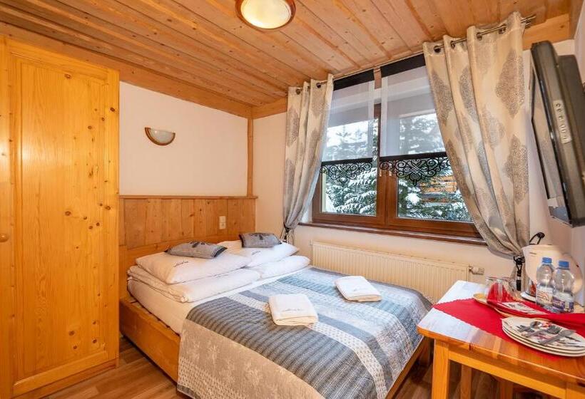 Quarto Estandar, Willa Cztery Pory Roku