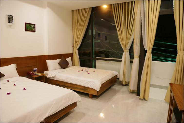 اتاق استاندارد چهارنفره با بالکن, Danang Beach 2