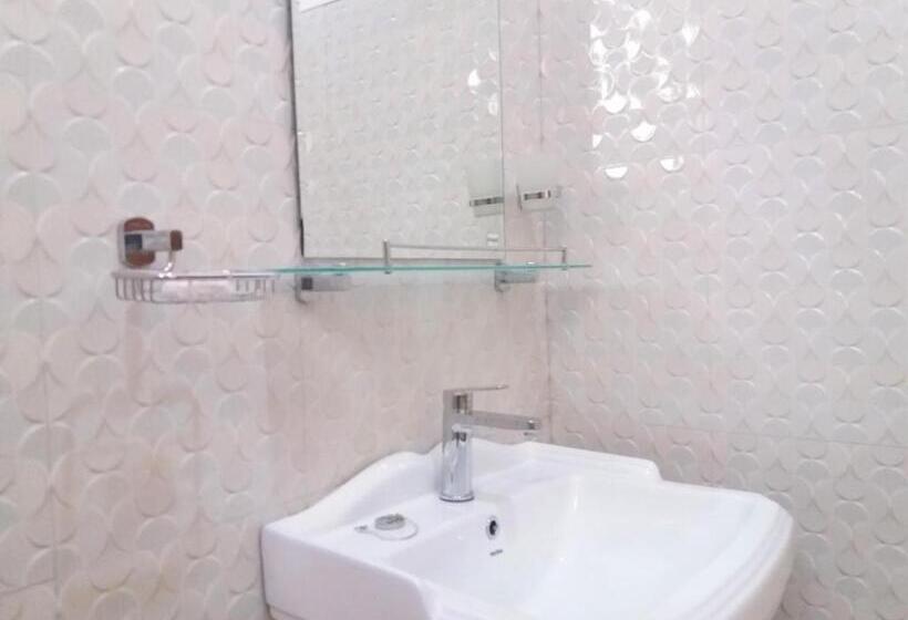 Quarto Estandar, Dinaro Guest