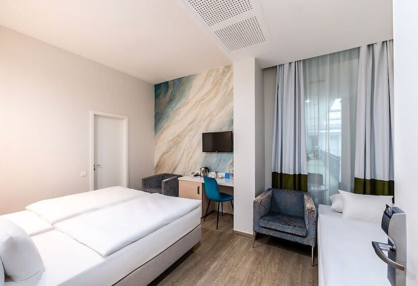 Quarto Estandar, Atrium Fashion