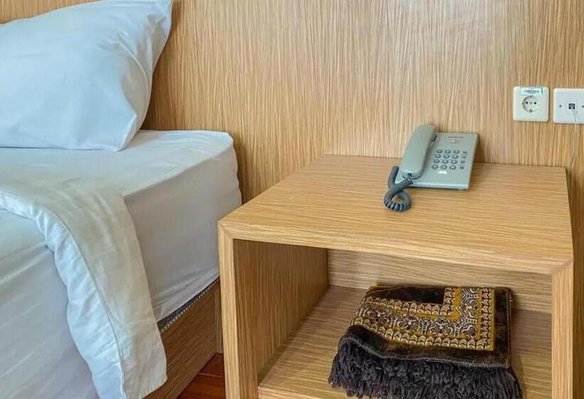 Номер Economy, De Malang Sweet Homestay Syariah Mitra Reddoorz