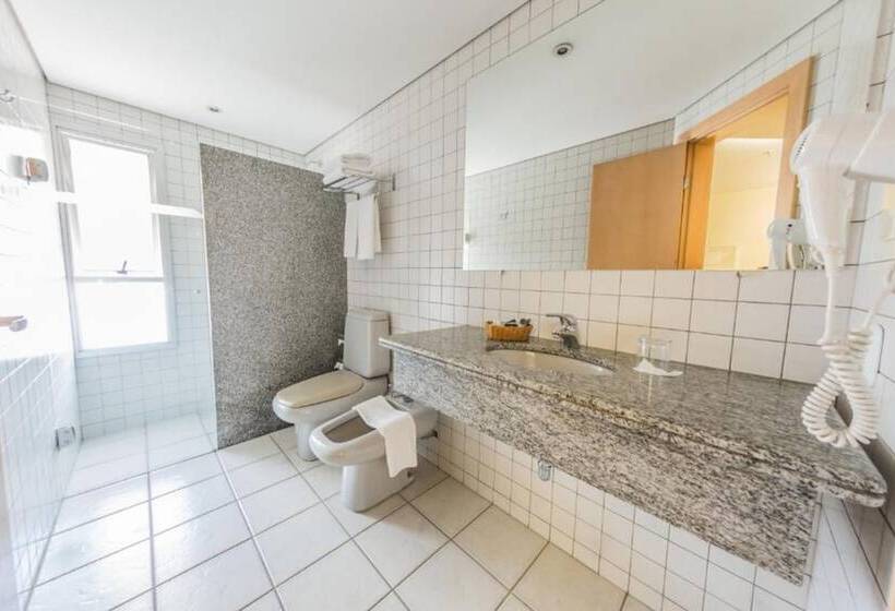 Quarto Deluxe, Grand Bittar