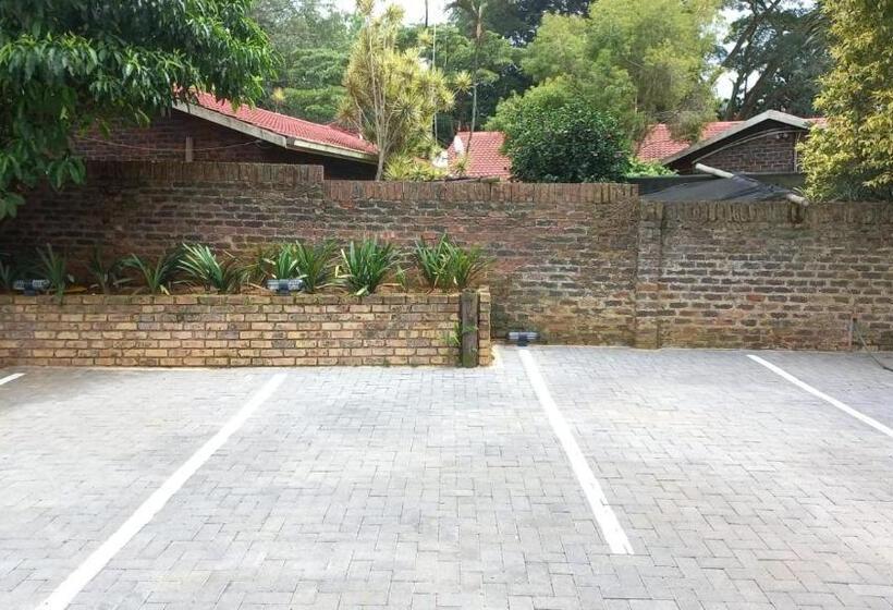 디럭스 스위트 킹 침대, Kruger S Guest House