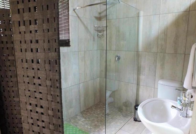 디럭스 스위트 킹 침대, Kruger S Guest House