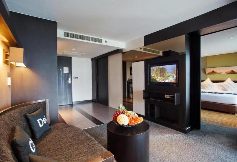 Quarto Deluxe, Golden Tulip Mandison Suites