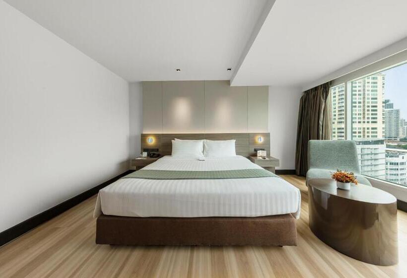 Quarto Deluxe, Golden Tulip Mandison Suites