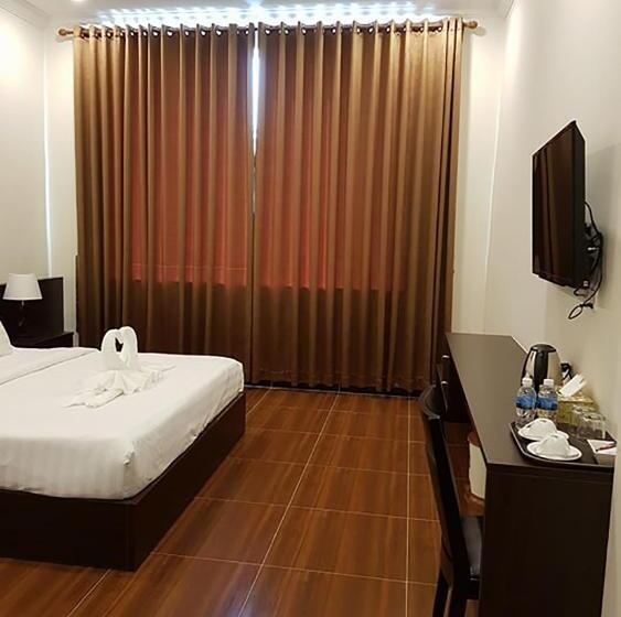 キングサイズベッドのデラックスルーム, Apple Hotel Two   Near Phnom Penh Airport