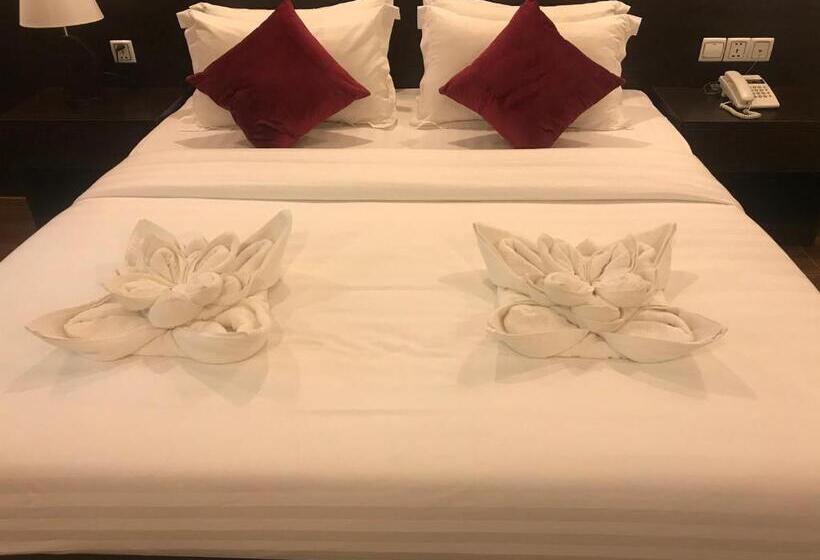 キングサイズベッドのデラックスルーム, Apple Hotel Two   Near Phnom Penh Airport