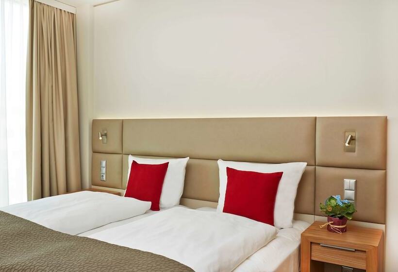 Номер Deluxe, H4 Hotel München Messe
