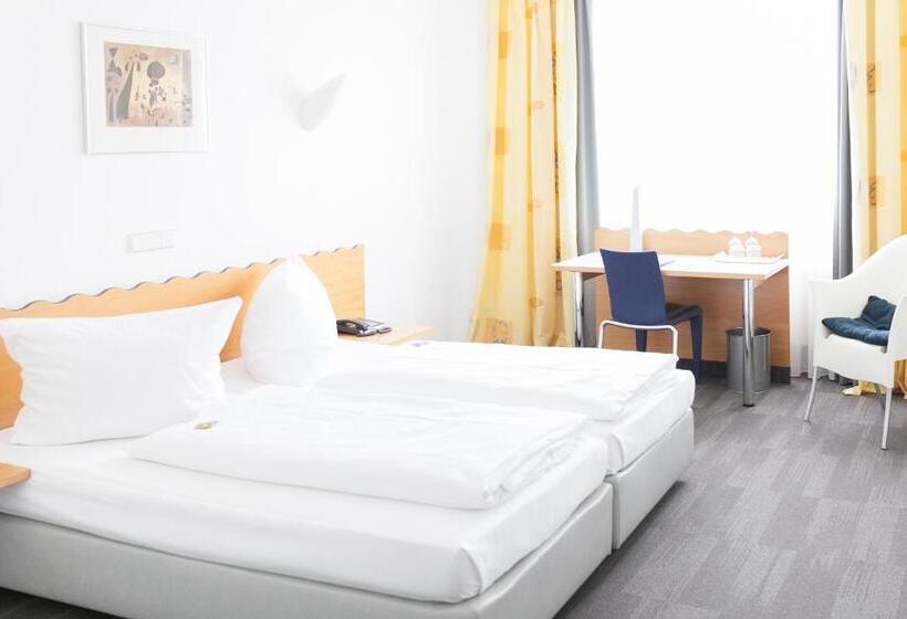 Quarto Estandar, Ambiente