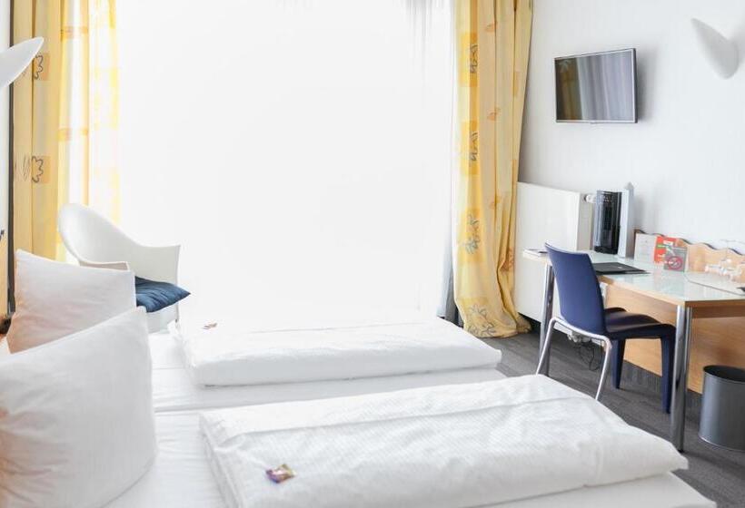 Quarto Estandar, Ambiente