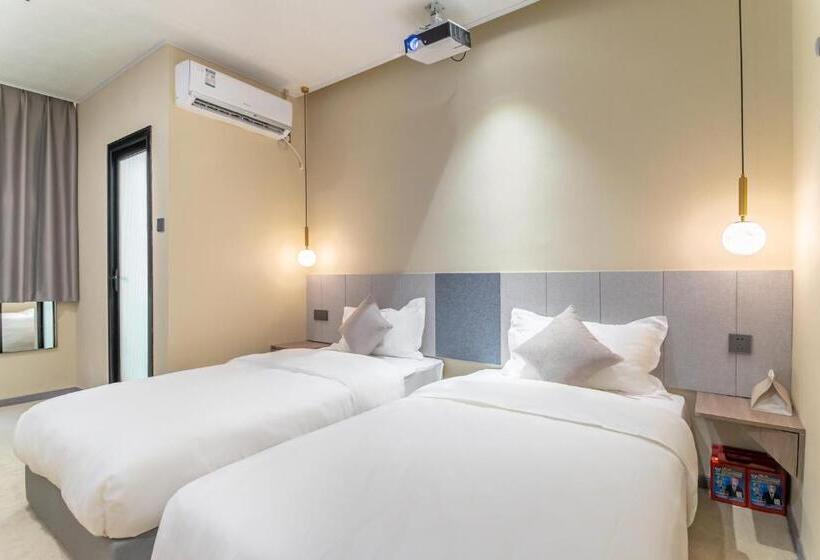 Quarto Deluxe, Puzzle Hotel Guangzhou Fenghuang New Village Subway Station