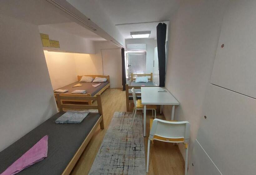 تختخواب در اتاق مشترک, Hostel Inn Downtown