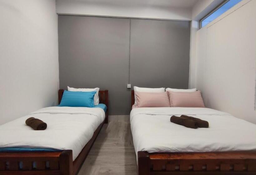 Quarto Familiar, Zamanja Betong106 Main Street