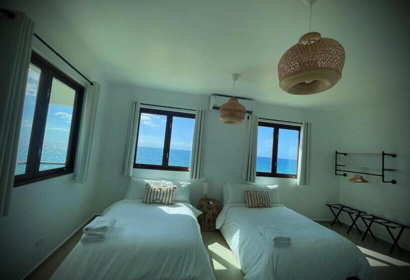 اتاق لوکس چهار تخته, 1 Corcega Beachfront Suites