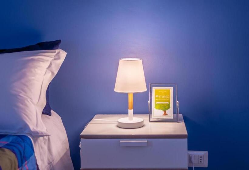 اتاق استاندارد چهارنفره با بالکن, Melo Accommodations