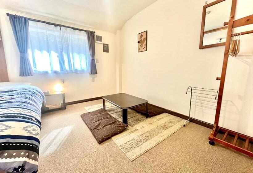 Quarto Familiar, En Chan House