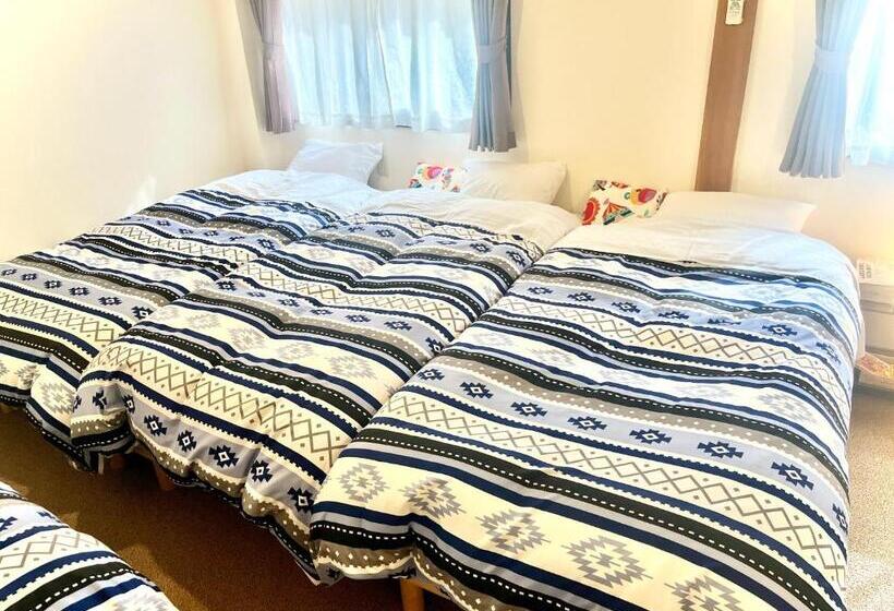 Quarto Familiar, En Chan House