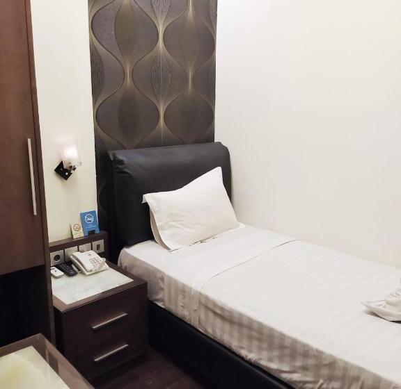 חדר סטנדרד יחיד חדר אמבטיה משותף, Omah Qu Guesthouse Malioboro