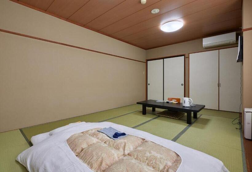 Quarto Familiar, Simizu