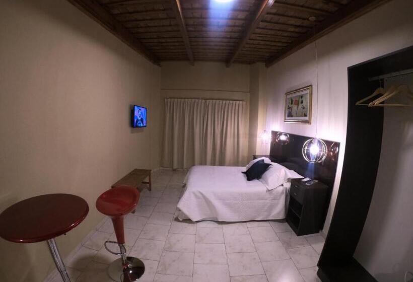 Quarto Deluxe, Eclat Suites Hotel Boutique