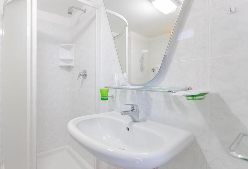 Quarto Triplo Estandar com Sacada, City